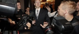 Whistleblowing website Wikileaks founder Julian Assange leaves a news conference on the internet release of secret documents about the Iraq War in London